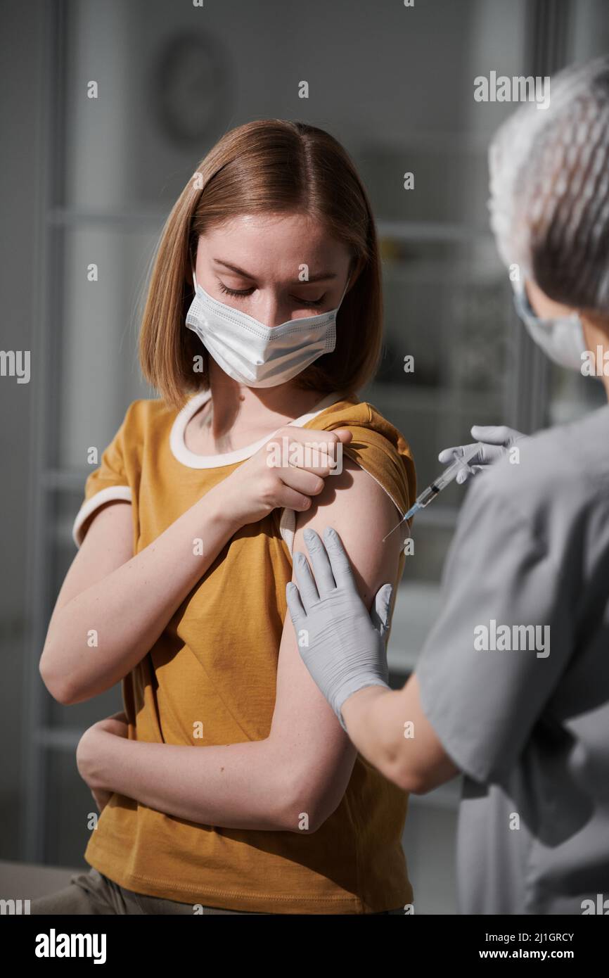 Doctor arm over shoulder hi-res stock photography and images - Alamy