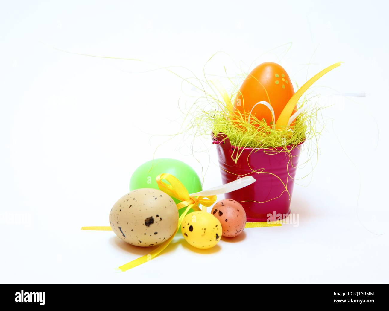 Easter eggs and chickens on white isolated background Stock Photo