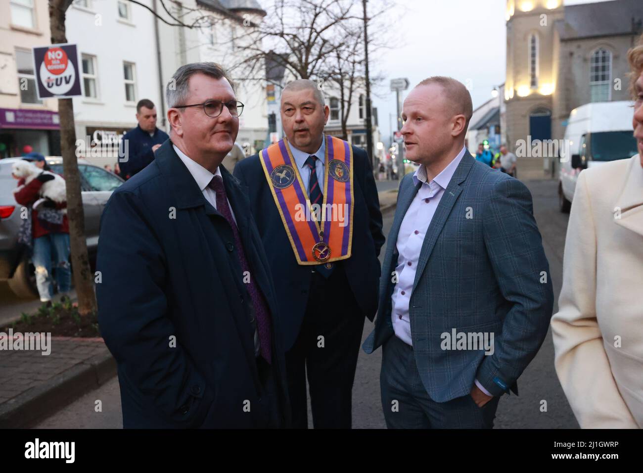 (left to right) Sir Jeffrey Donaldson, John McGregor and Loyalist blogger Jamie Bryson during a anti Northern Ireland Protocol rally and parade, organised by North Antrim Amalgamated Orange Committee, in Ballymoney, Co Antrim. Picture date: Friday March 25, 2022. Stock Photo