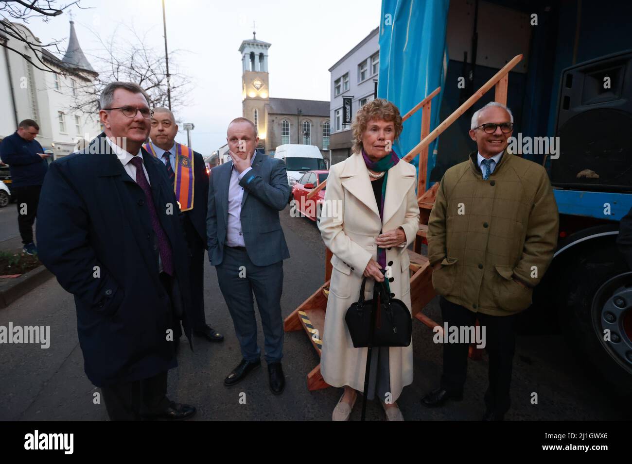 (left to right) Sir Jeffrey Donaldson, John McGregor and Loyalist blogger Jamie Bryson, Kate Hoey and Ben Habib during a anti Northern Ireland Protocol rally and parade, organised by North Antrim Amalgamated Orange Committee, in Ballymoney, Co Antrim. Picture date: Friday March 25, 2022. Stock Photo
