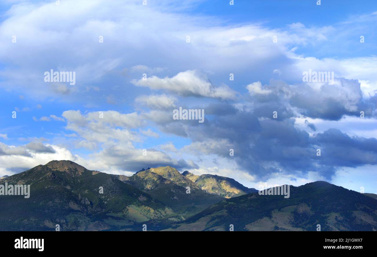The view from Paradise Valley, in Wyoming, includes two mountain ranges.  This rugged panara includes the Absaroka Mountains. Stock Photo