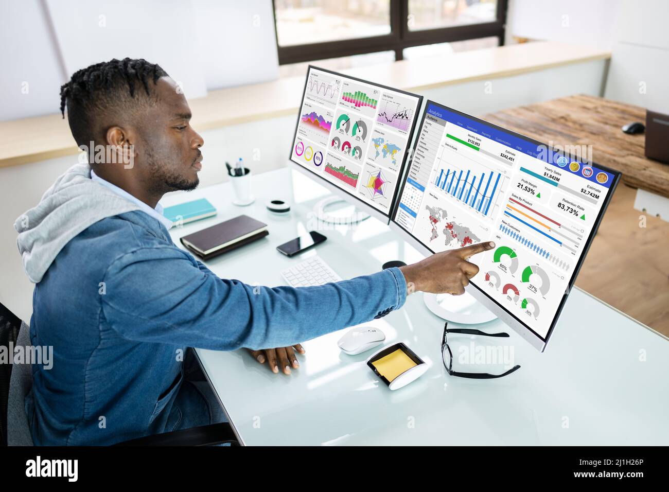 African American Business Man Analyst Using Data Analytics Stock Photo