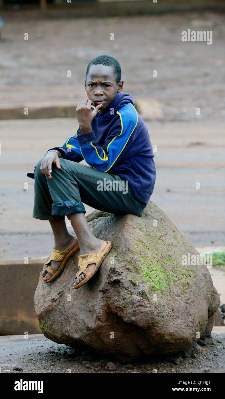 Portrait of a Tanzanian boy taken in s small village in the Ngorongoro region in northern Tanzania. Stock Photo