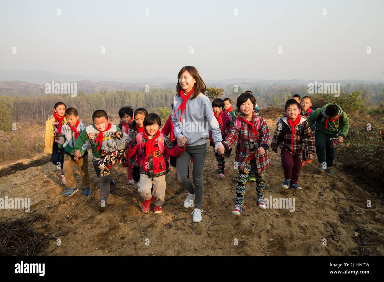 Small Group Teaching Rural Rural women teachers and students in the play Stock Photo - Alamy