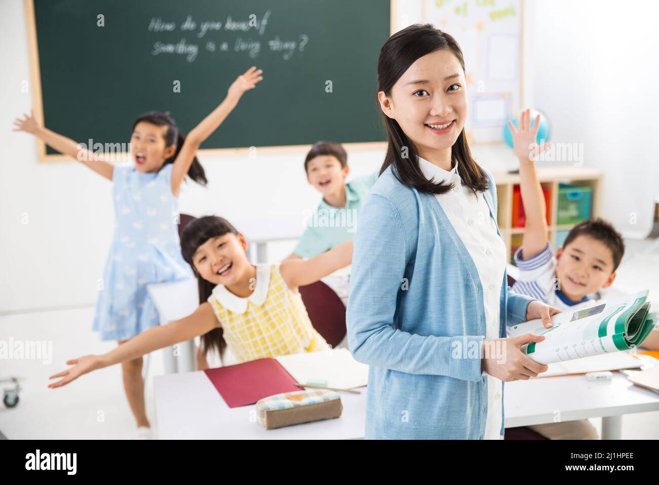 Teachers and pupils in the classroom Stock Photo - Alamy