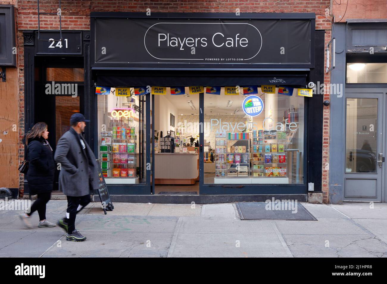 Players Cafe, 241 Bleecker St, New York, NY. exterior storefront of a curated convenience store concept by lotto.com in the Greenwich Village Stock Photo