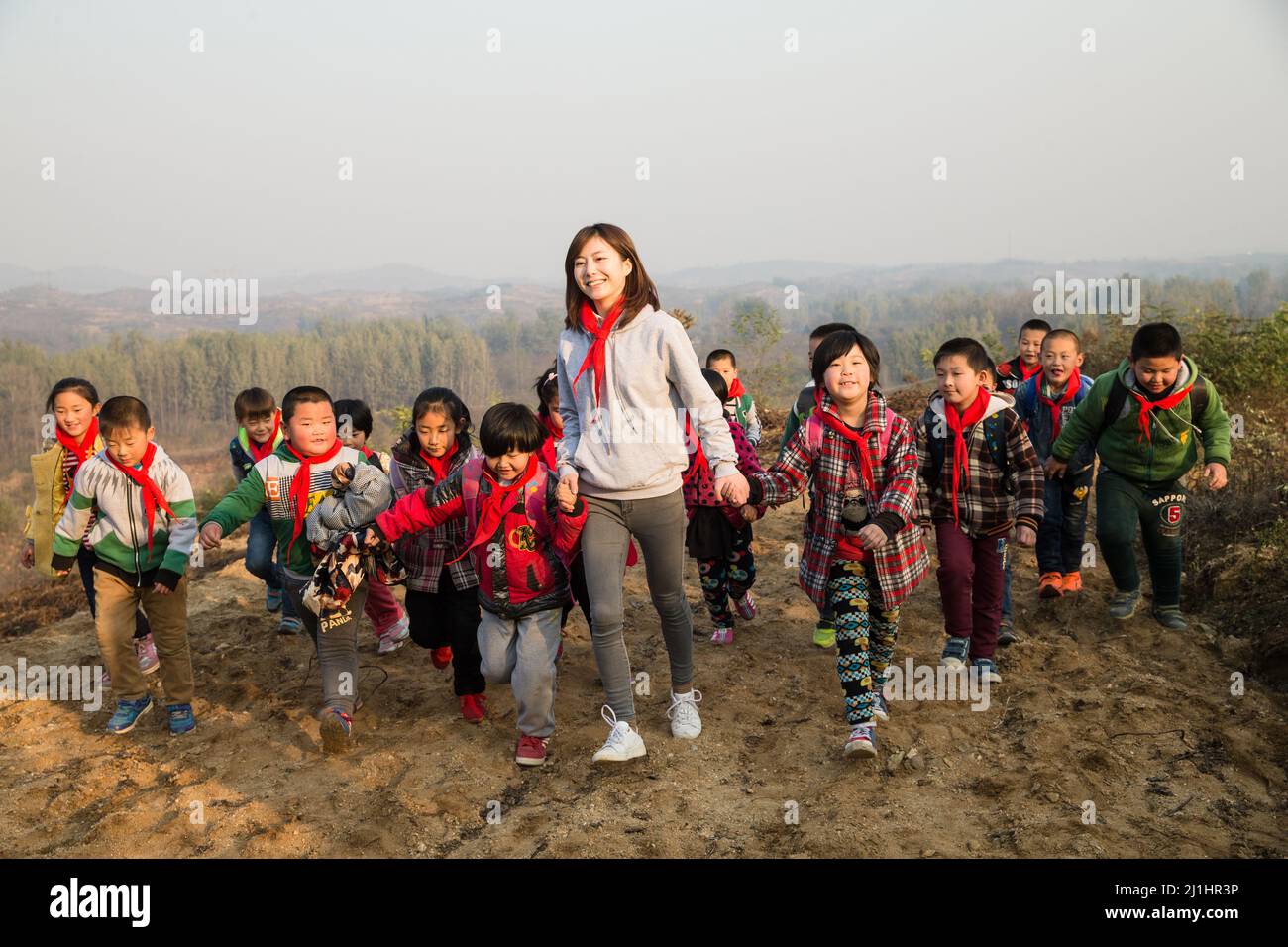 Small Group Teaching Rural Rural women teachers and students in the play Stock Photo - Alamy