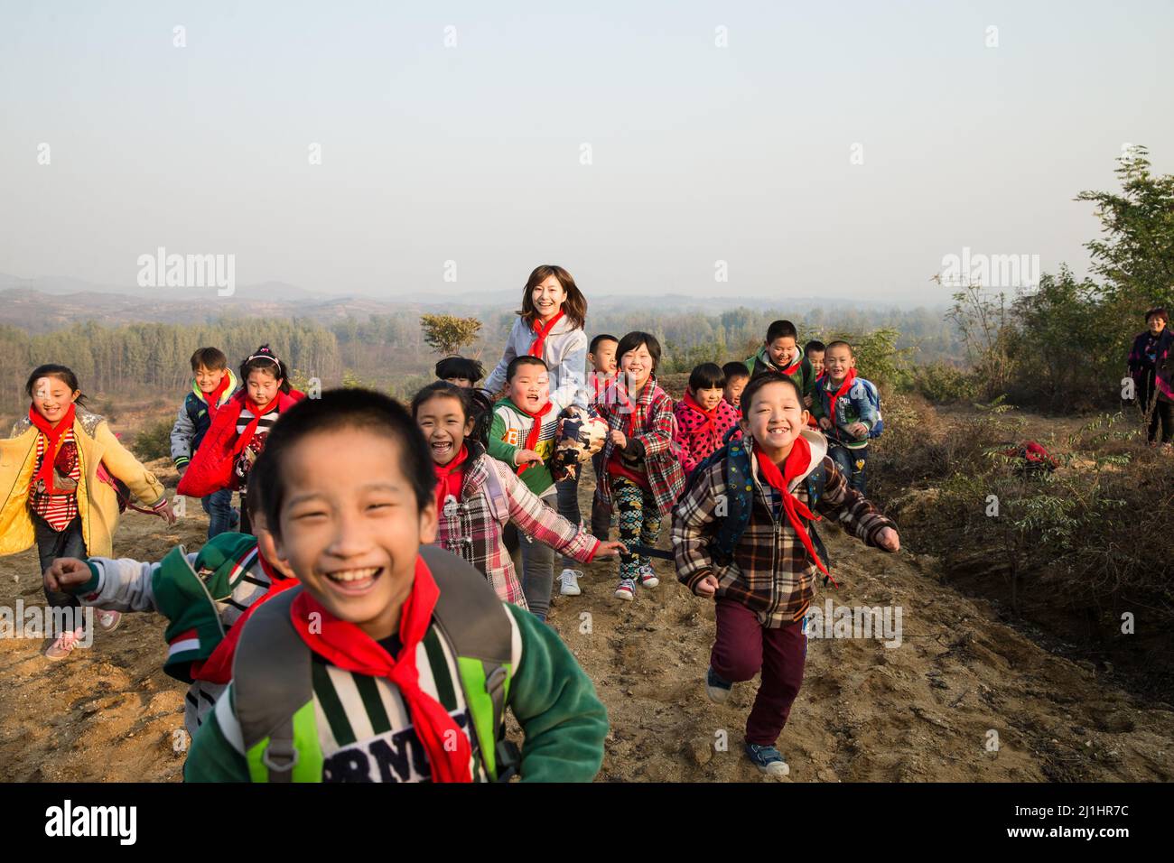Small Group Teaching Rural Rural women teachers and students in the play Stock Photo - Alamy