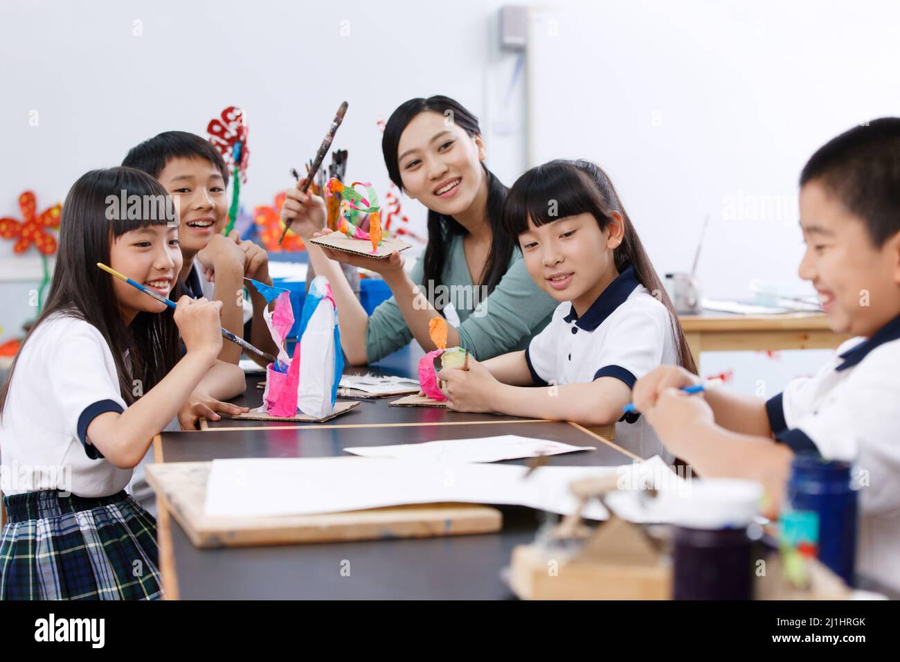 The teacher and students in the class Stock Photo