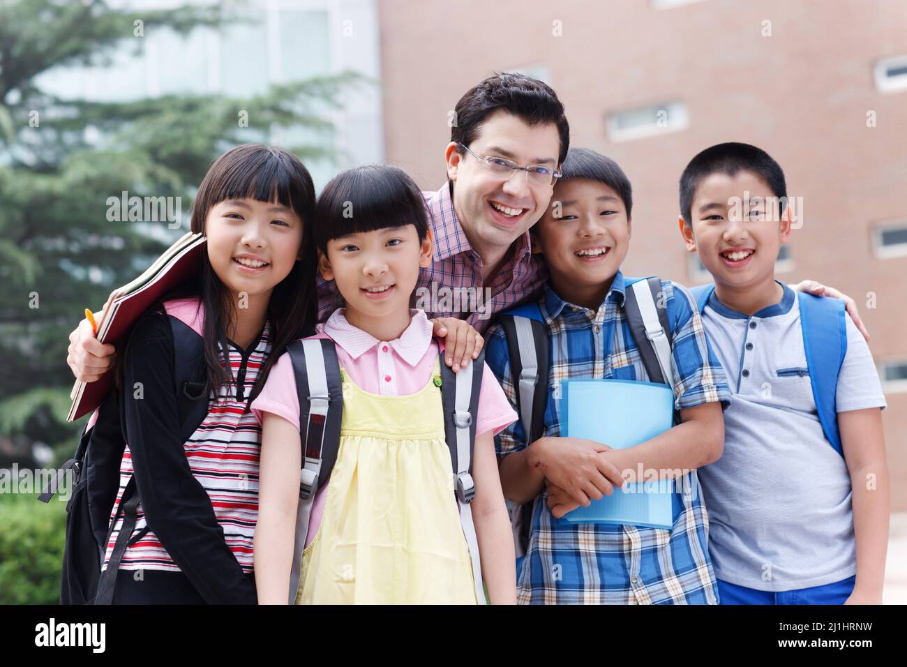 The teacher and students in the class Stock Photo
