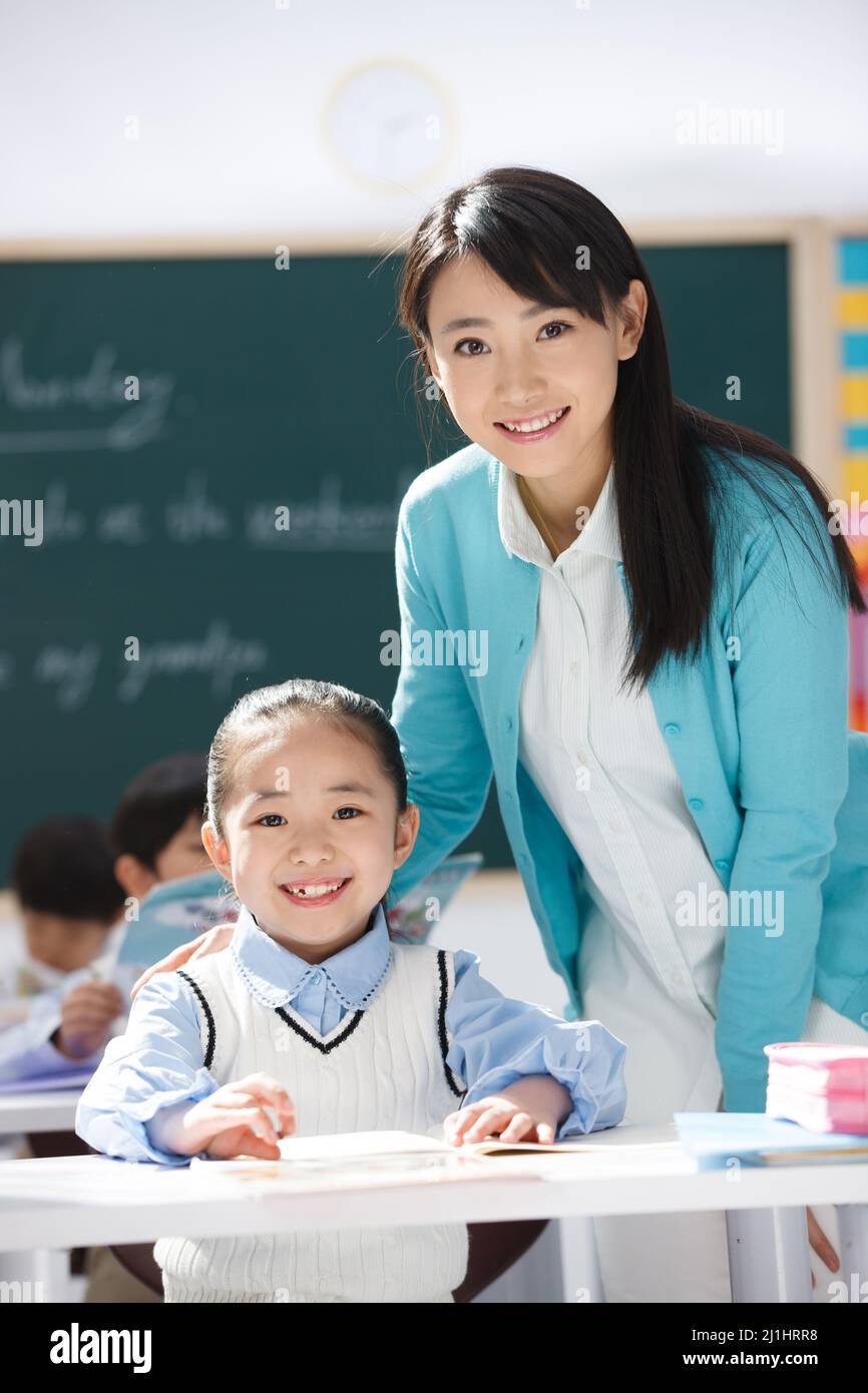 Elementary school students and teachers in class Stock Photo Alamy