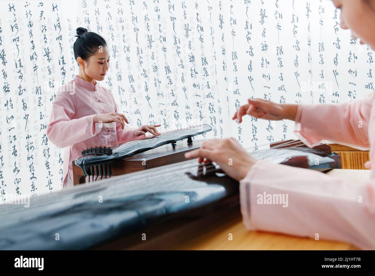 The youth teacher taught the pupils learn guzheng Stock Photo Alamy