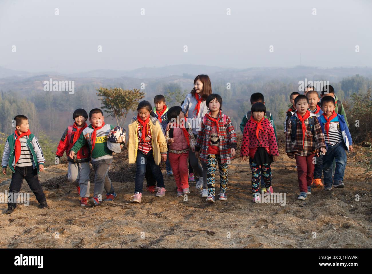Small Group Teaching Rural Rural female teachers and students play Stock Photo - Alamy
