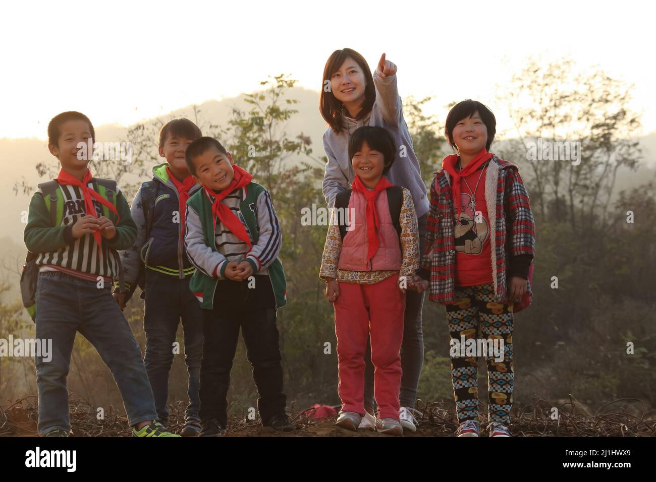 Small Group Teaching Rural Rural female teachers and students in the wild Stock Photo - Alamy