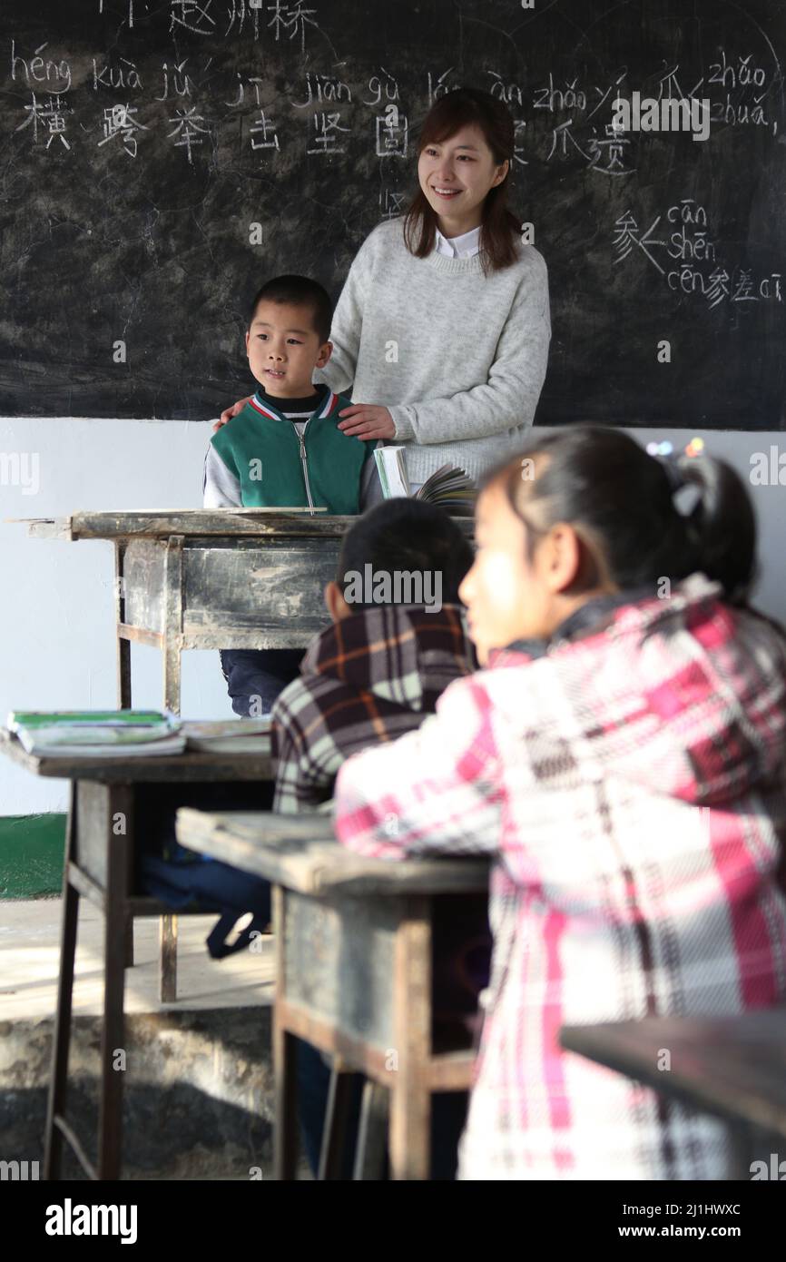 Rural female teachers and pupils in the classroom Stock Photo - Alamy