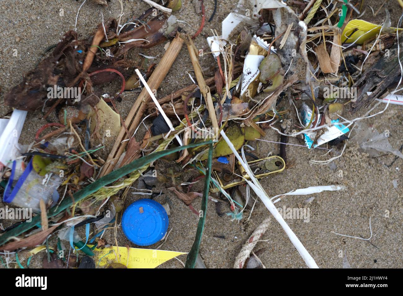 A random marine debris, mostly plastic, on a beach after heavy storm Stock Photo