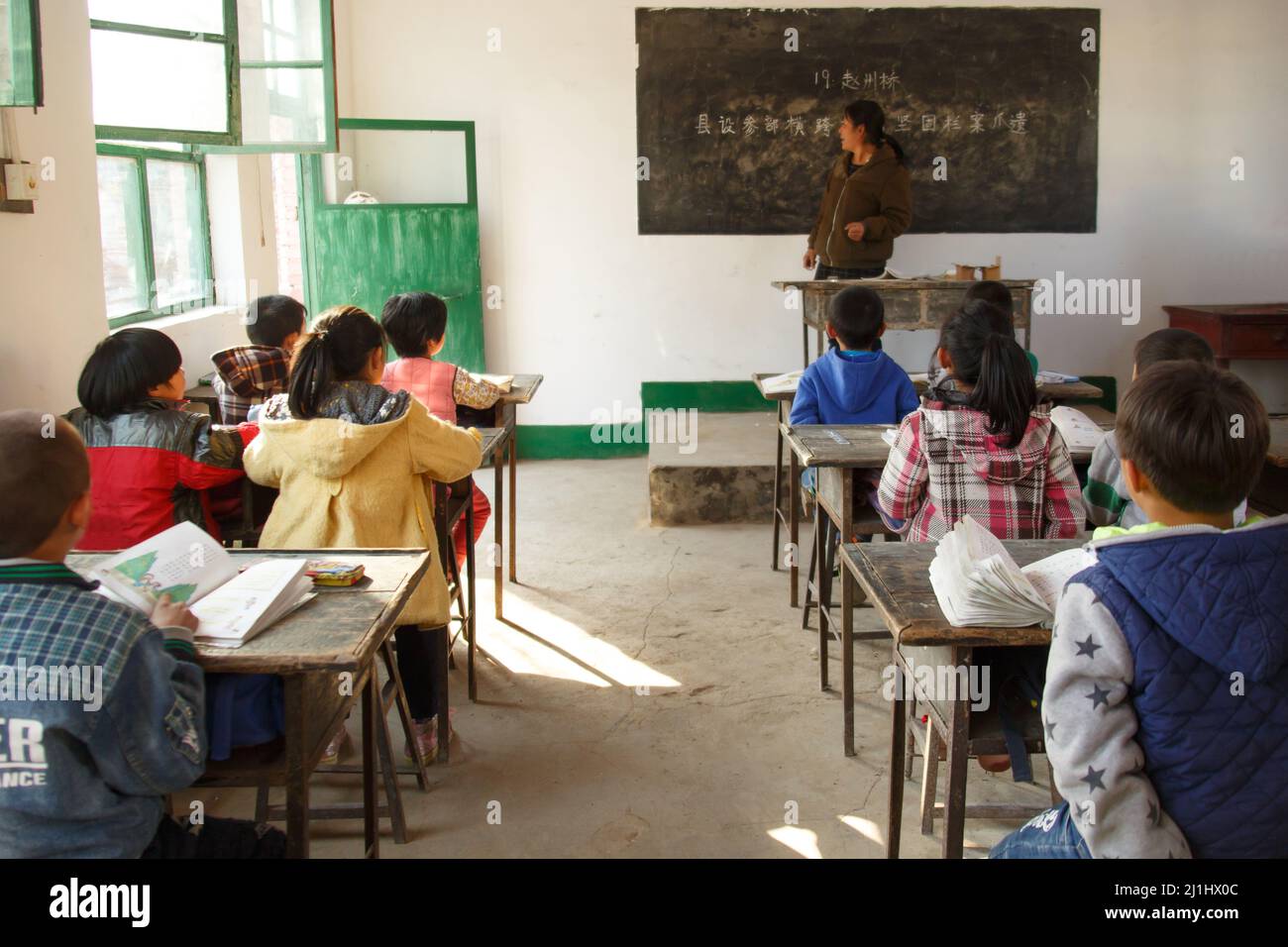 Rural female teachers and pupils in the classroom Stock Photo - Alamy
