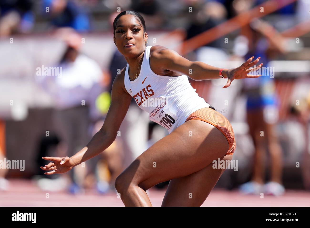 Stacey Ann Williams of Texas prepares to take the handoff in the womens 4x400m relay during the 94th Clyde Littlefield Texas Relays, Friday, Mar 25, 2022, in Austin