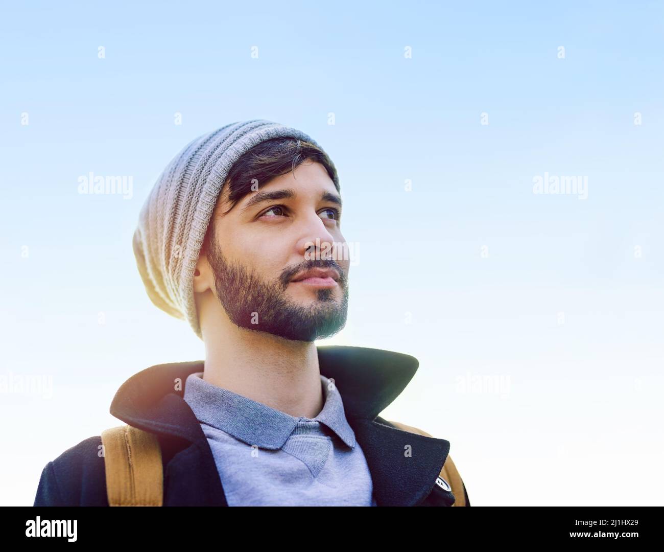 Serious young man backpack hi-res stock photography and images - Alamy