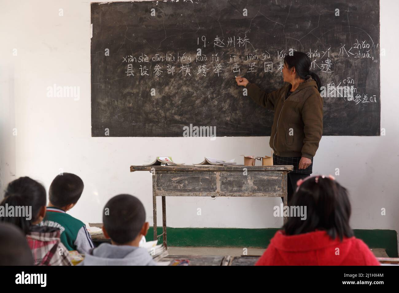 Rural female teachers and pupils in the classroom Stock Photo - Alamy