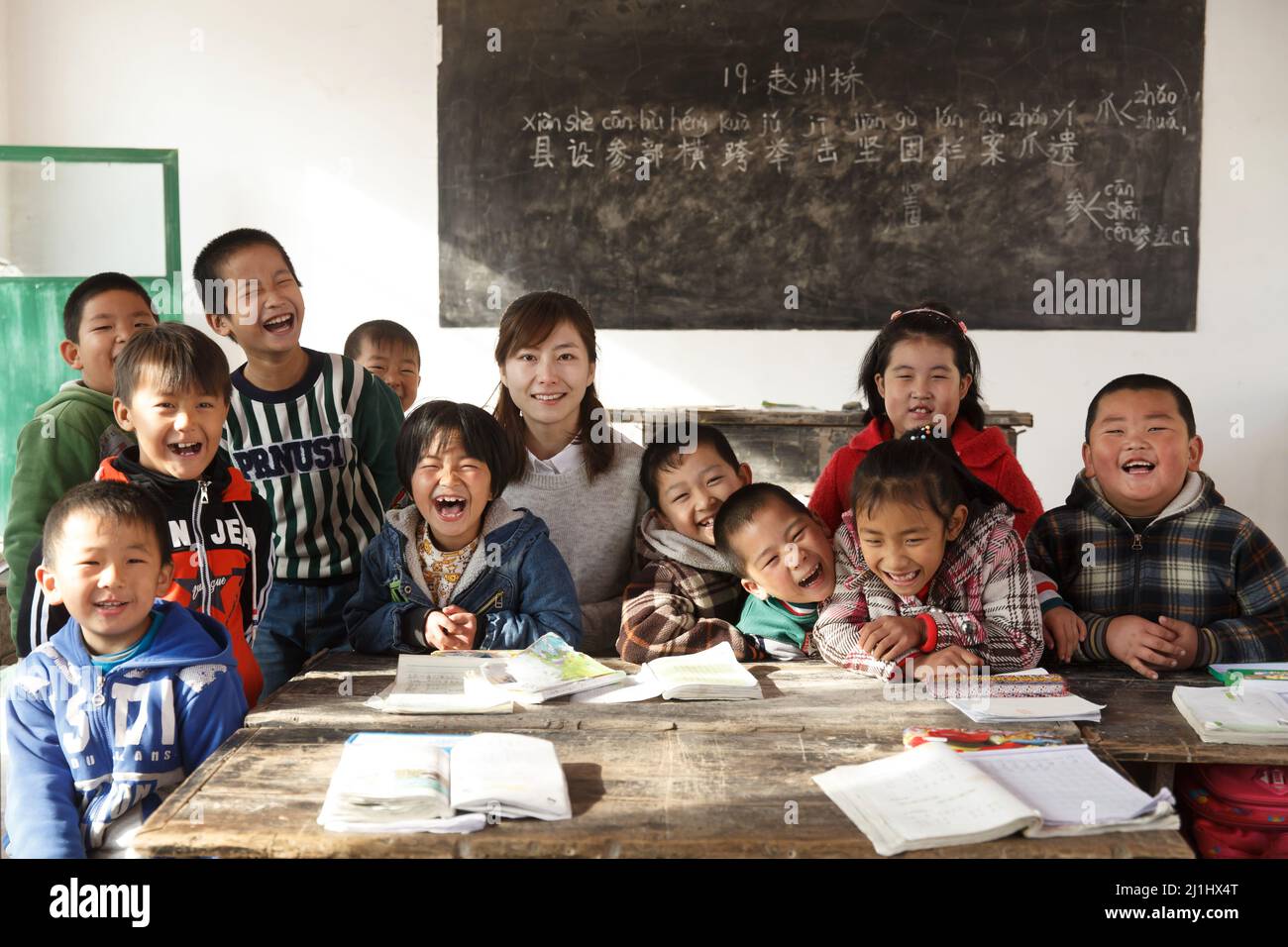 Rural female teachers and pupils in the classroom Stock Photo - Alamy