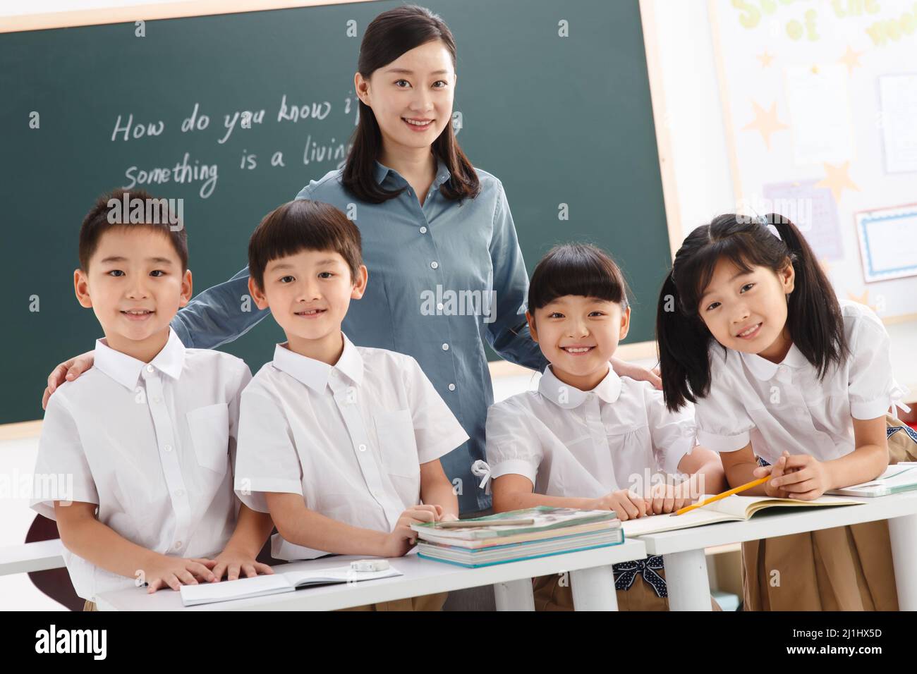 The teachers and pupils are in the classroom Stock Photo - Alamy