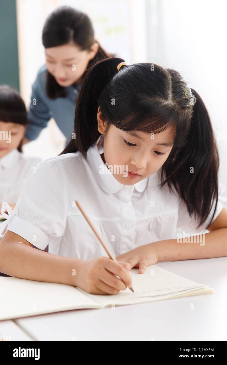 The teachers and pupils are in the classroom Stock Photo - Alamy