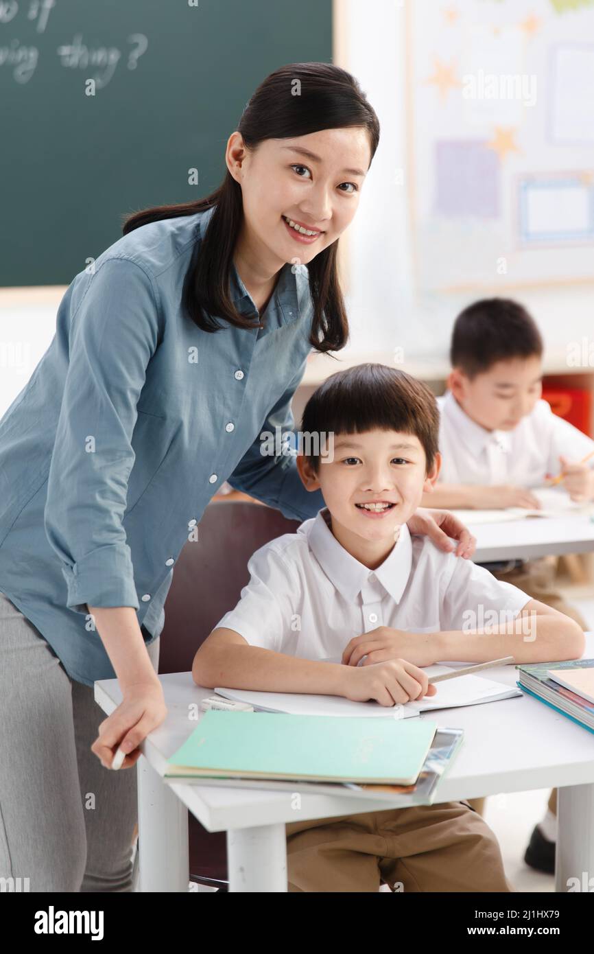 The teachers and pupils are in the classroom Stock Photo - Alamy