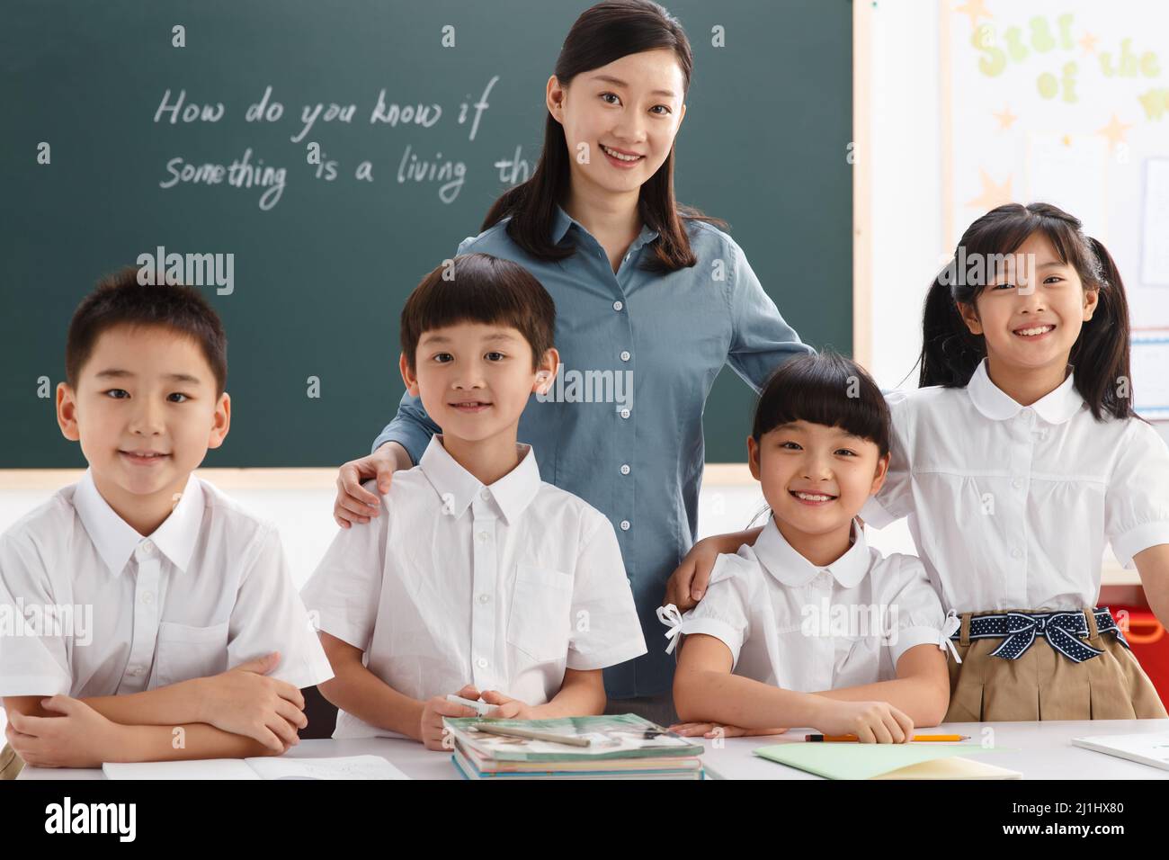 The teachers and pupils are in the classroom Stock Photo - Alamy