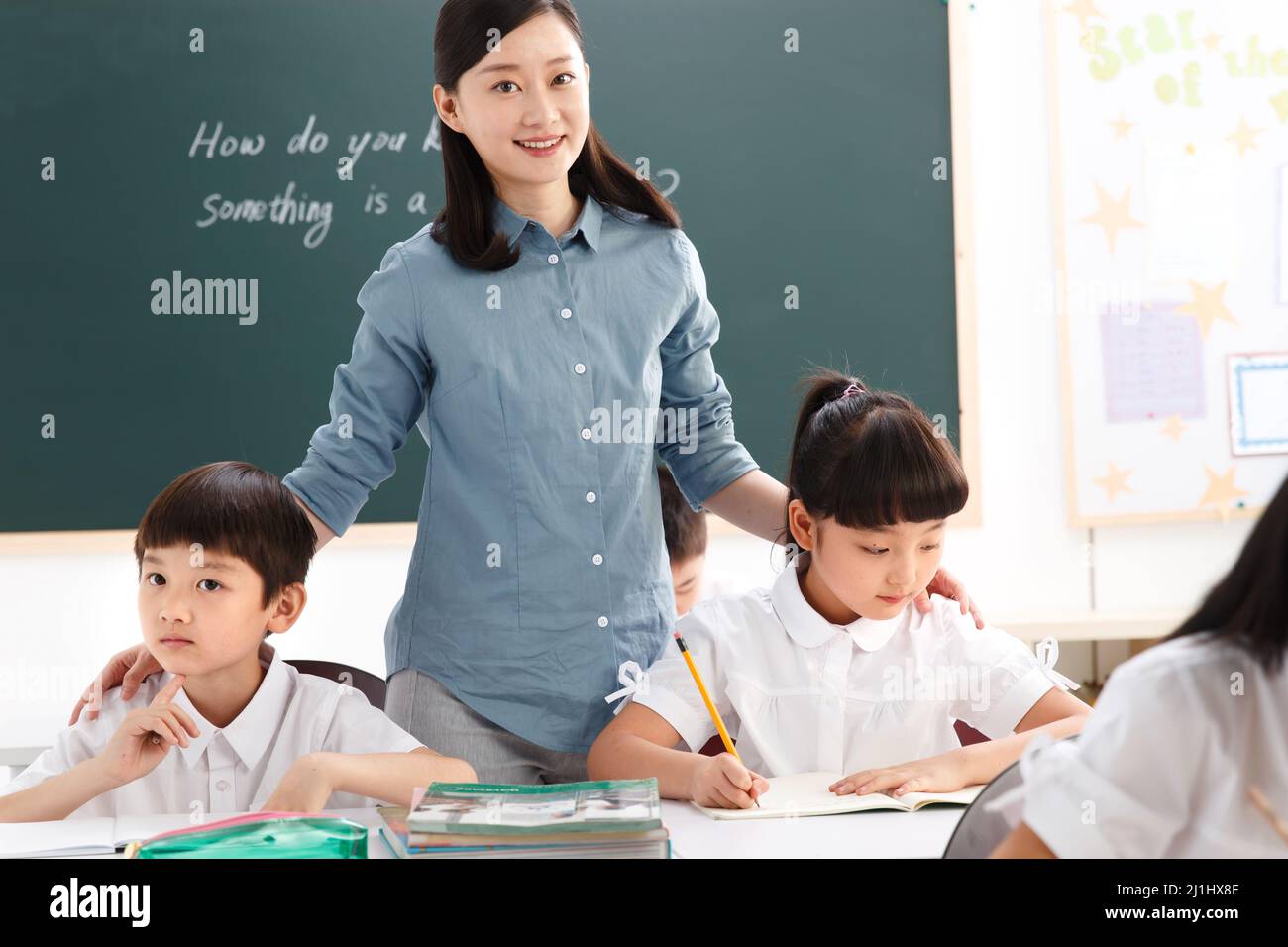 The teachers and pupils are in the classroom Stock Photo - Alamy