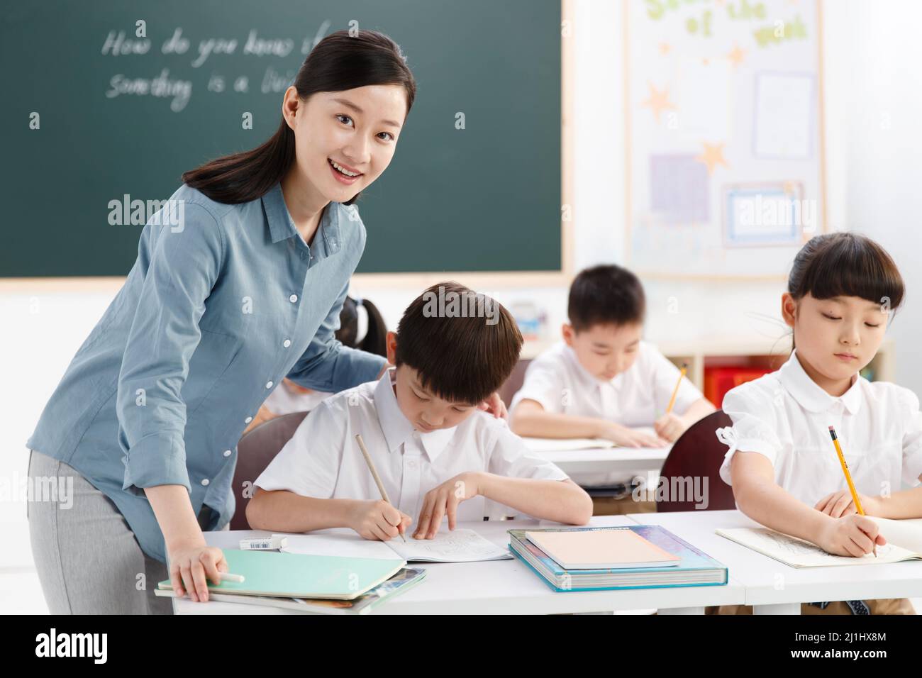 The teachers and pupils are in the classroom Stock Photo - Alamy