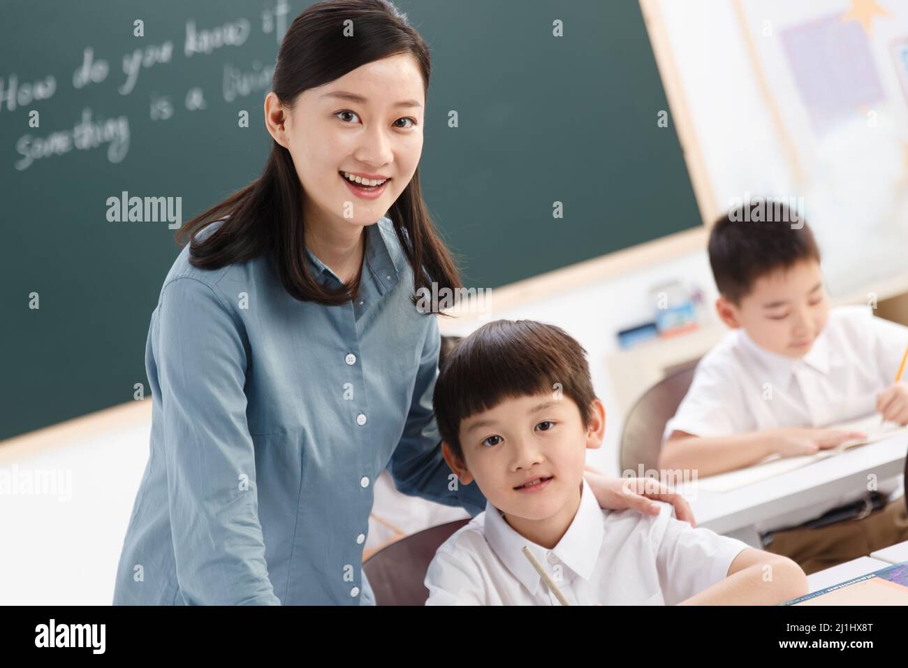 The teachers and pupils are in the classroom Stock Photo - Alamy