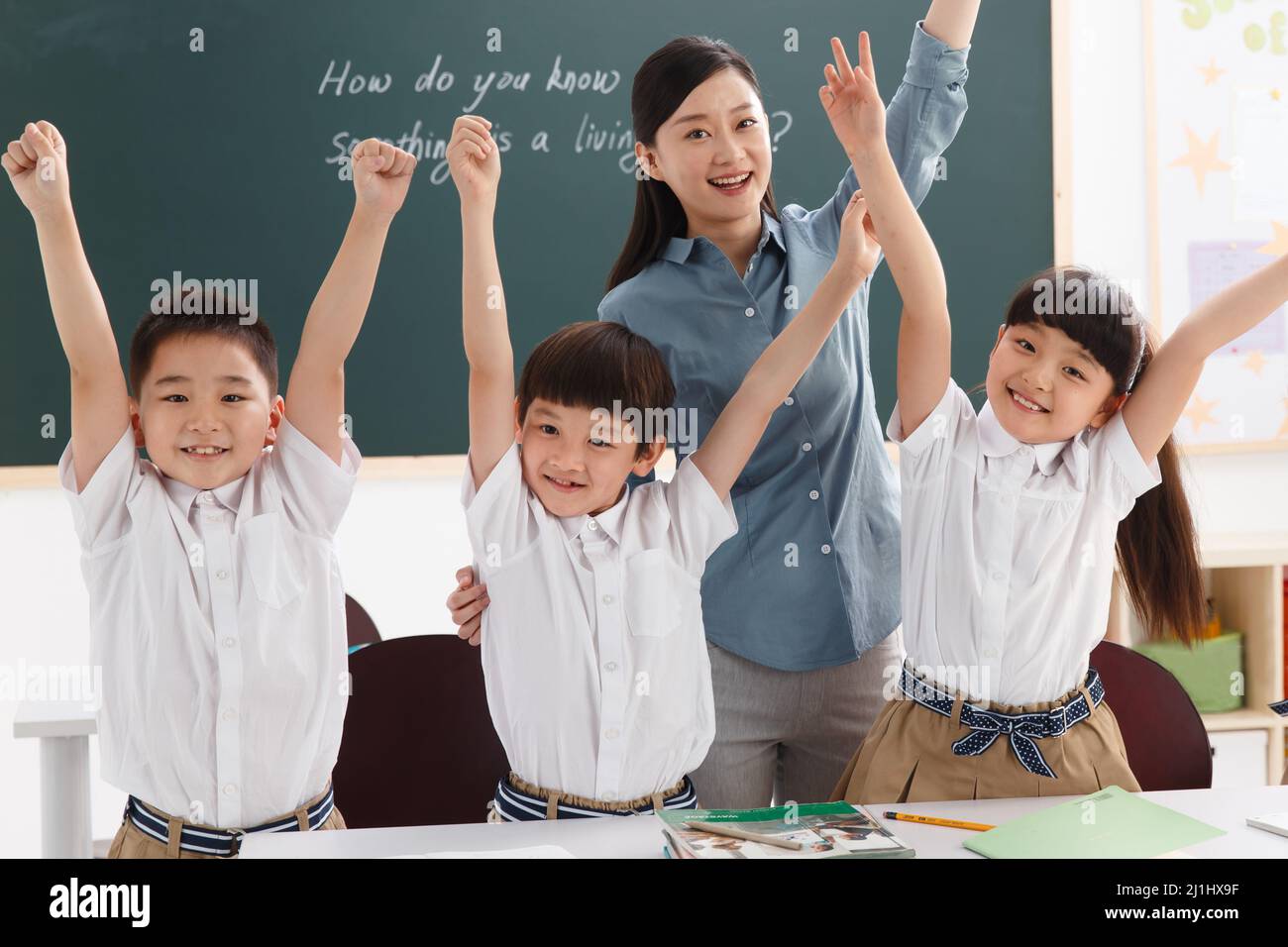 The teachers and pupils are in the classroom Stock Photo - Alamy