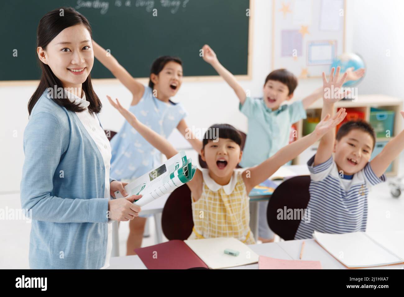 The teachers and pupils are in the classroom Stock Photo - Alamy
