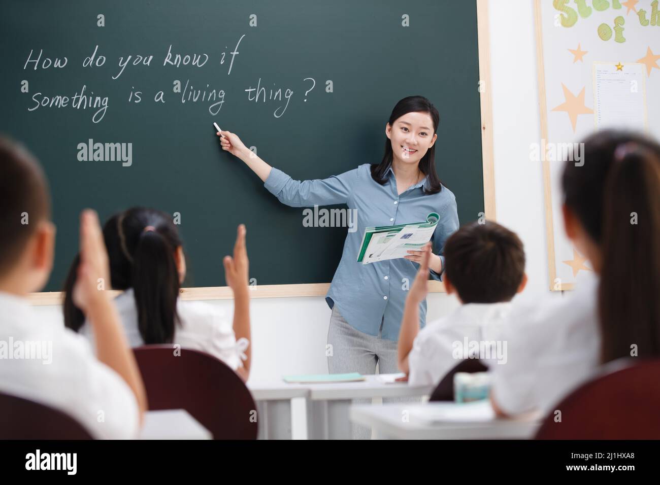 The teachers and pupils are in the classroom Stock Photo - Alamy