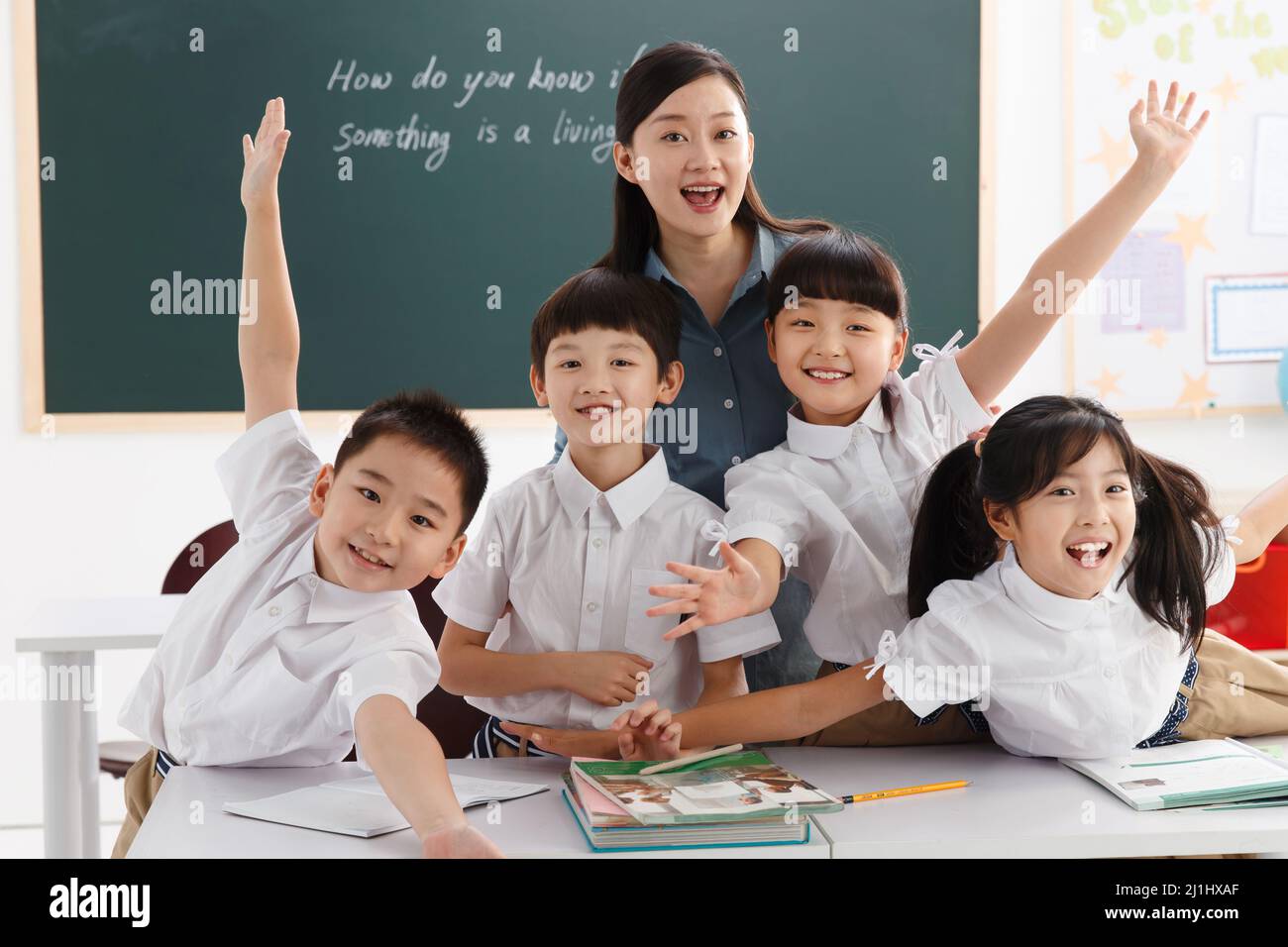 The teachers and pupils are in the classroom Stock Photo - Alamy