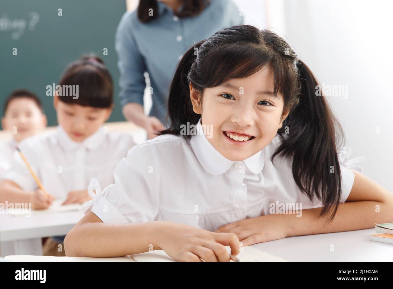 The teachers and pupils are in the classroom Stock Photo - Alamy