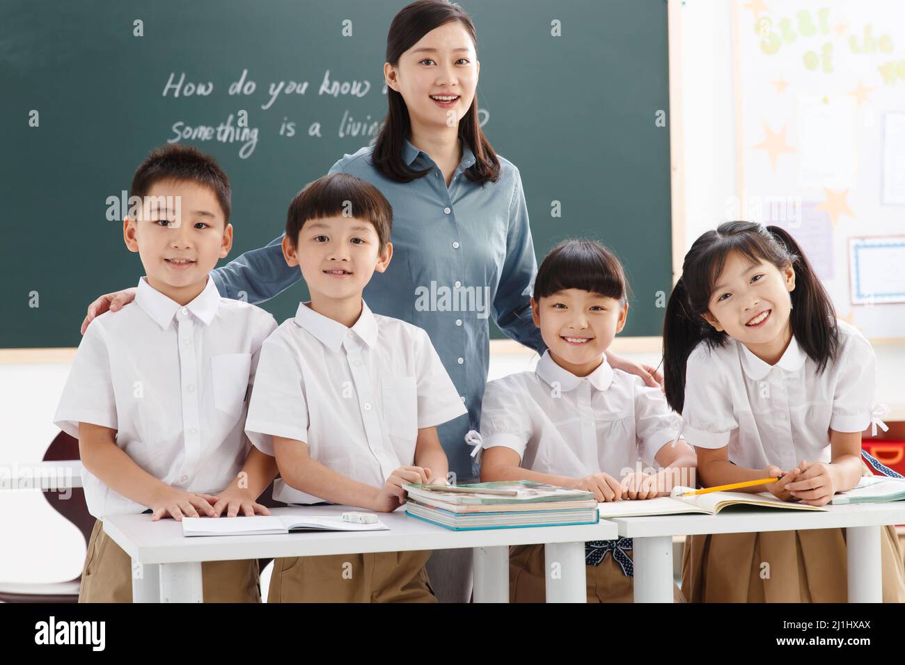 The teachers and pupils are in the classroom Stock Photo - Alamy