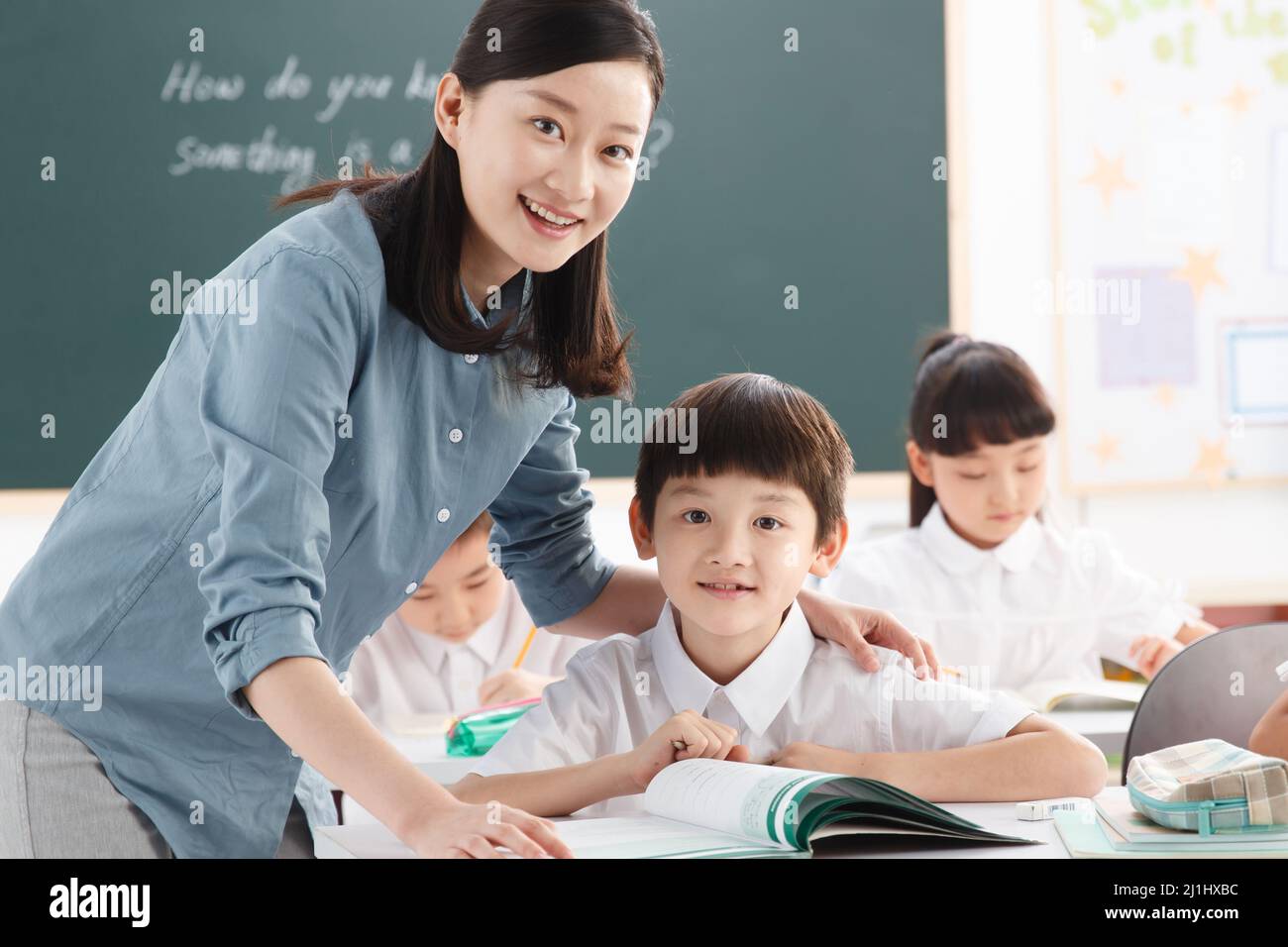 The teachers and pupils are in the classroom Stock Photo - Alamy