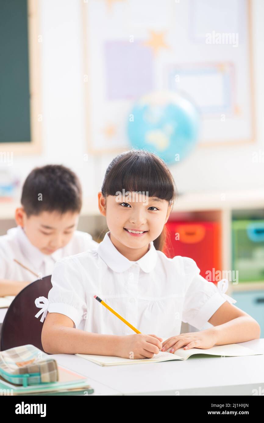 Elementary school students in class Stock Photo - Alamy