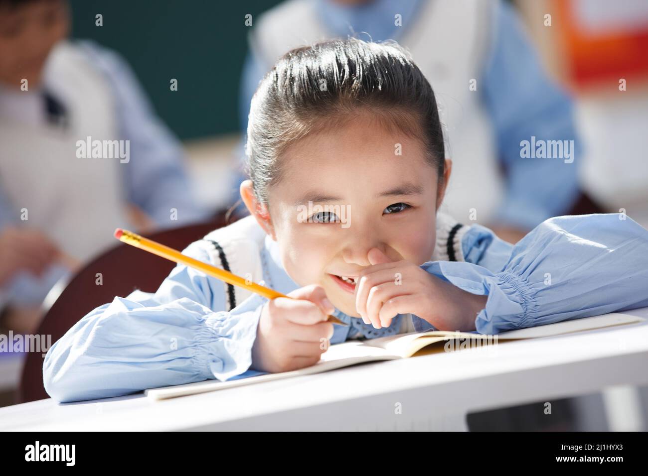 Elementary school students in class Stock Photo - Alamy