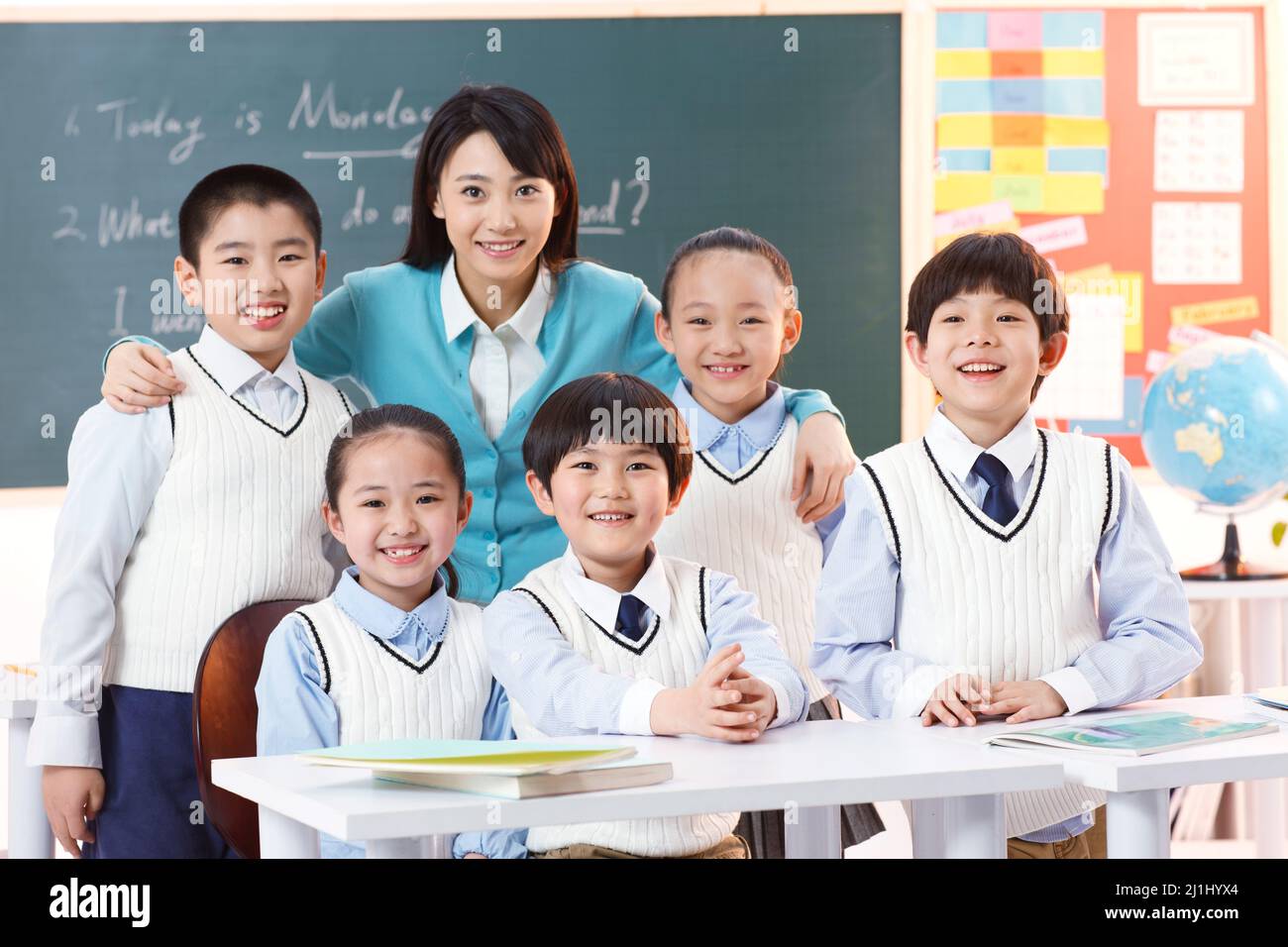 Elementary school students in class Stock Photo - Alamy