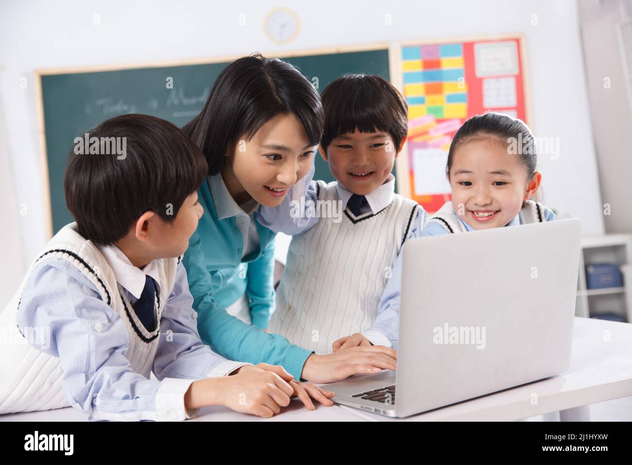 Elementary school students in class Stock Photo - Alamy