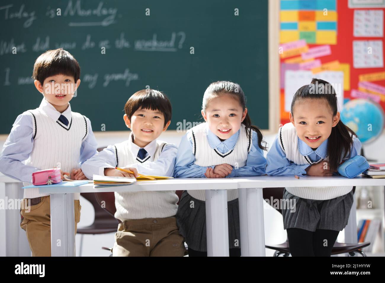 Elementary school students in class Stock Photo - Alamy