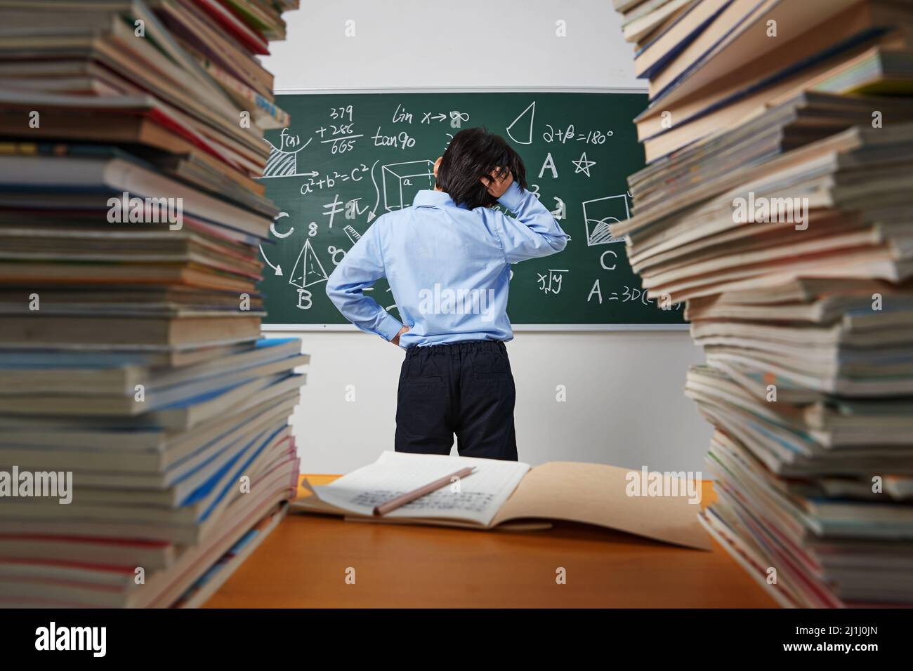 The back of elementary school boys were math problem difficult Stock ...