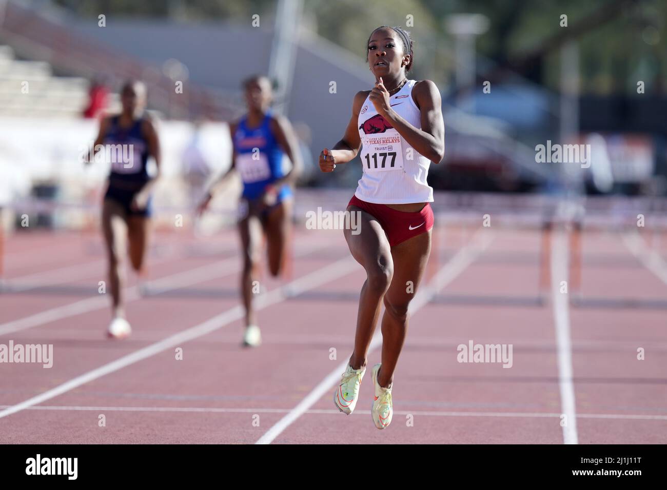 Britton Wilson of Arkansas wins the women's 400m hurdles in 54.37 during the 94th Clyde Littlefield Texas Relays, Friday, Mar 25, 2022, in Austin. Tex Stock Photo