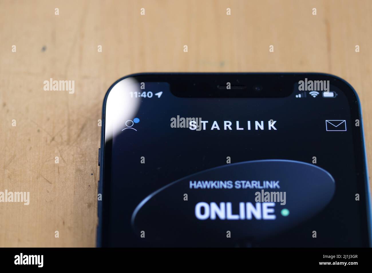 The top of the SpaceX Starlink app on an iPhone. The app for the new satellite internet service signals green and online. Stock Photo