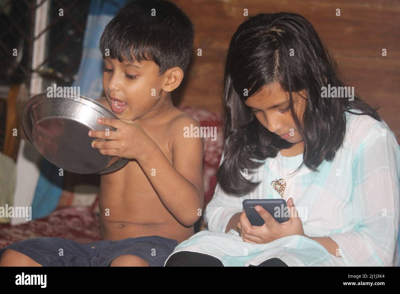 14-Aug-2019 Barisal, Bangladesh.Two Bangladeshi brothers and sisters. Stock Photo