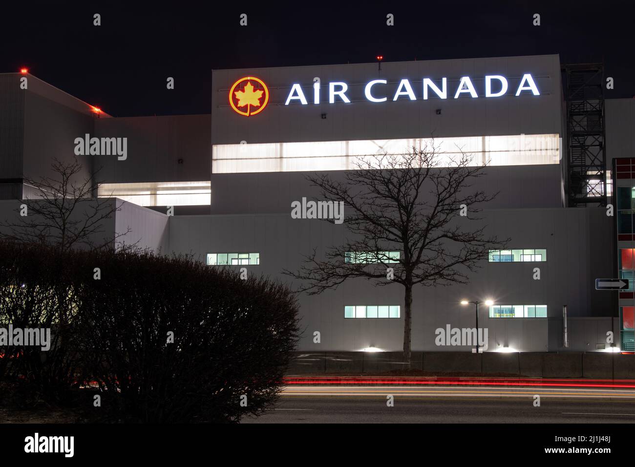 A newly constructed Air Canada hanger and office at Toronto Pearson Airport is seen at night. Stock Photo