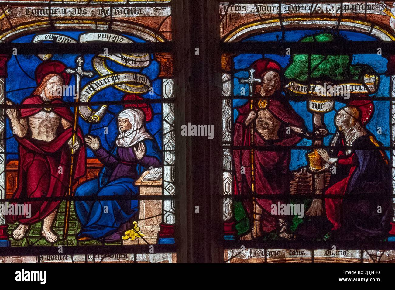 Before his Ascension, Jesus appears to his mother, the Virgin Mary, and to his female disciple, Mary Magdalene: details of a colourful 16th century Renaissance stained glass window in the village church at Ceffonds, in the Champagne region of northeast France, telling the story of the Resurrection. Stock Photo